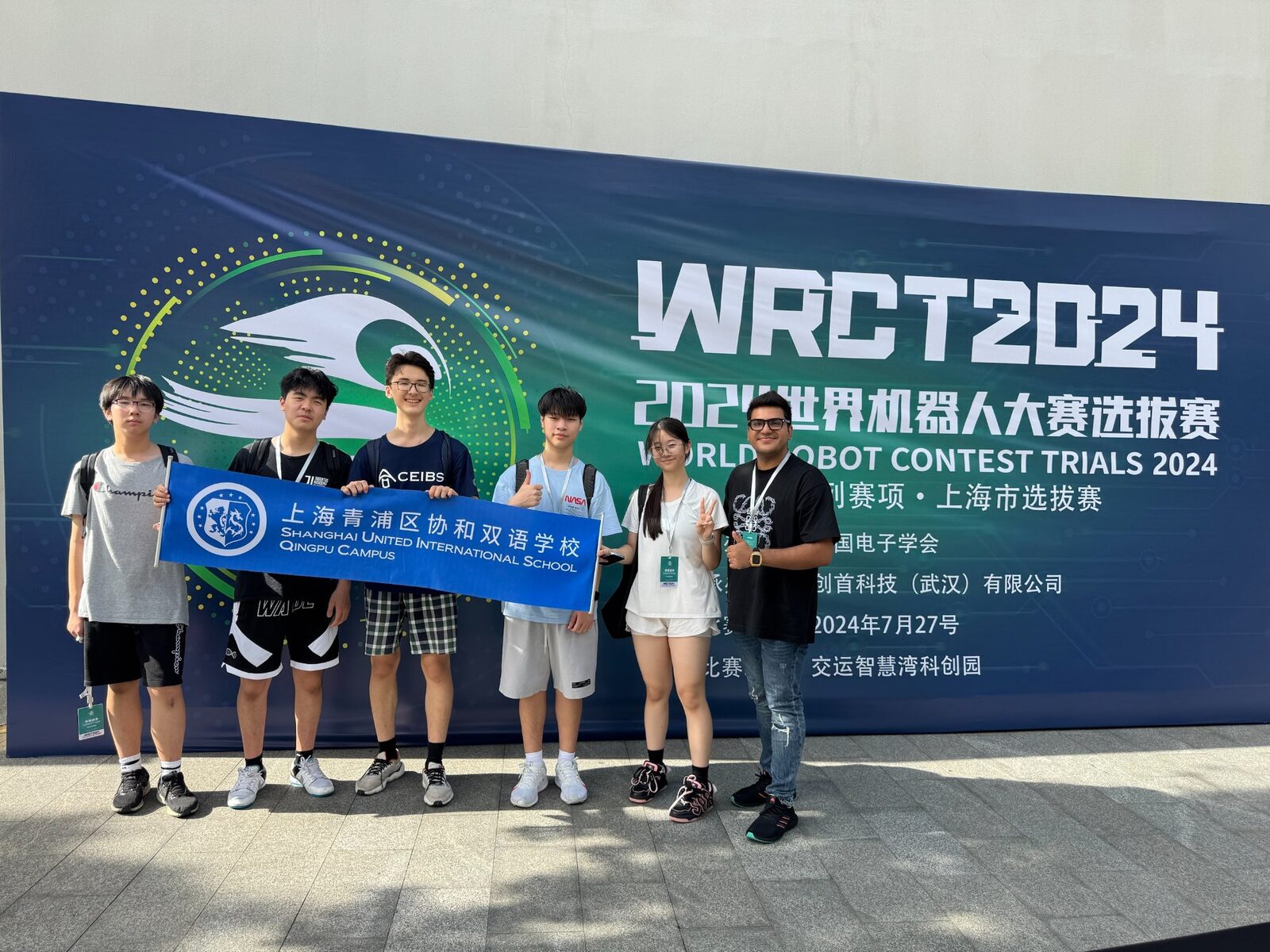 Sushil Lamba robotics teacher with SUIS Qingpu students at World Robot Contest Trials 2024 Shanghai